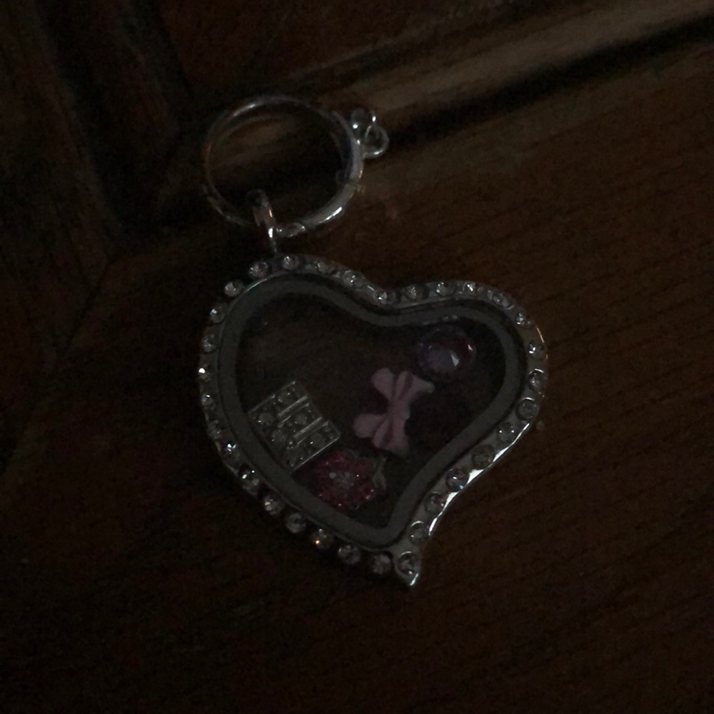 Floating heart locket
